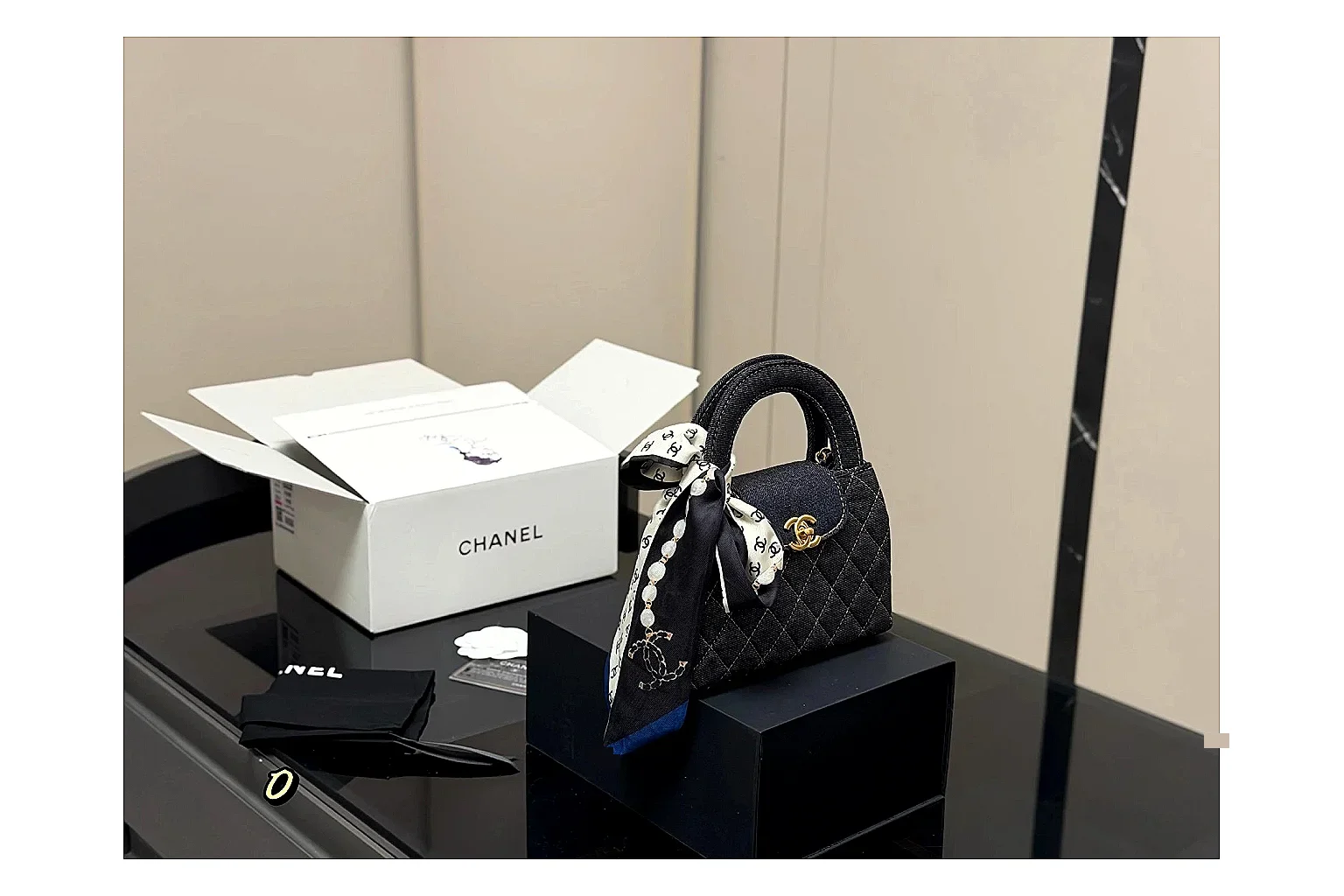Chanel Quilted Chain Bag Black OOPBuy route photo showing black quilted leather body, chain strap, flap profile, and polished luxury hardware