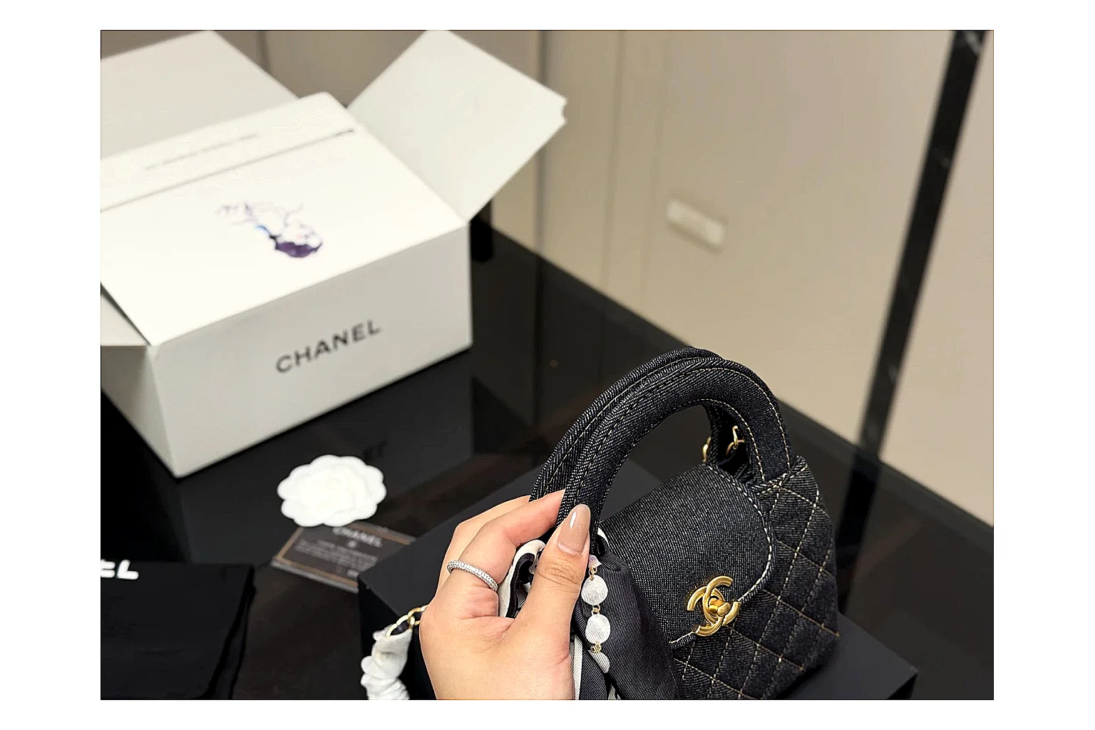 Chanel Quilted Chain Bag Black OOPBuy route photo showing black quilted leather body, chain strap, flap profile, and polished luxury hardware thumbnail 3
