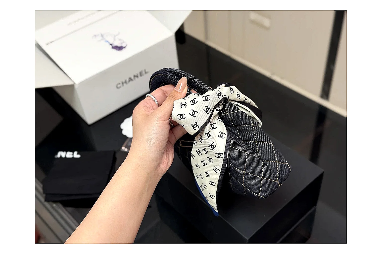 Chanel Quilted Chain Bag Black OOPBuy route photo showing black quilted leather body, chain strap, flap profile, and polished luxury hardware thumbnail 4