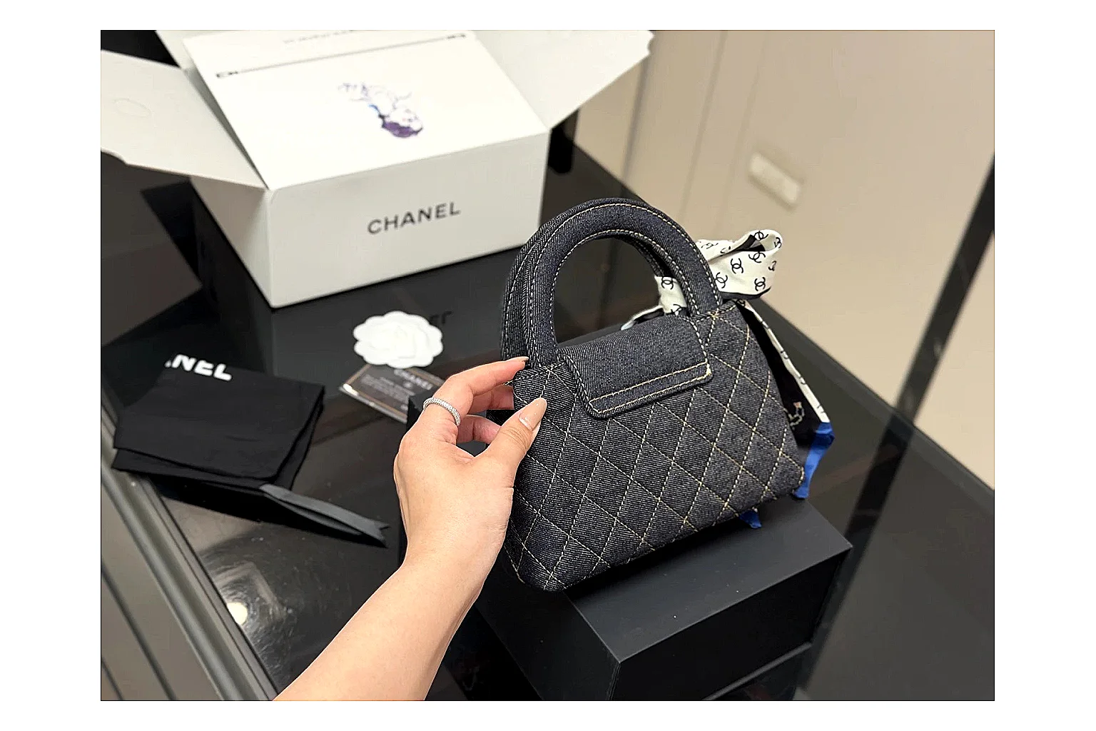 Chanel Quilted Chain Bag Black OOPBuy route photo showing black quilted leather body, chain strap, flap profile, and polished luxury hardware thumbnail 6