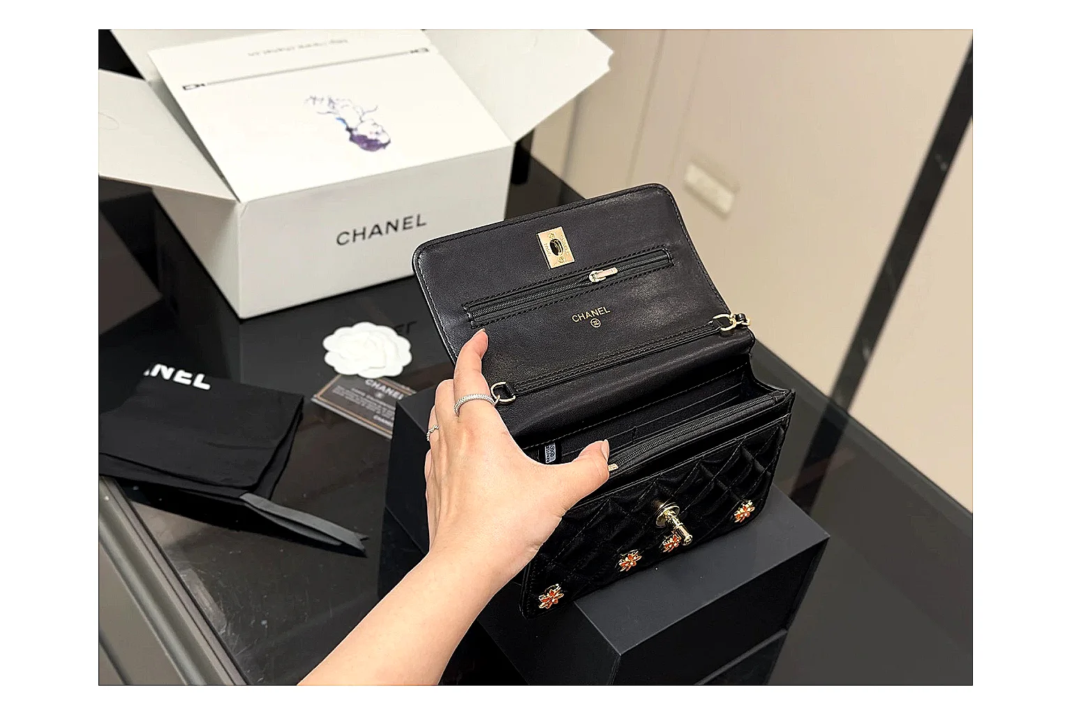 Chanel Quilted Wallet Bag Black Floral OOPBuy route photo showing black quilted wallet-bag body, floral detail, compact flap shape, and polished chain hardware thumbnail 3