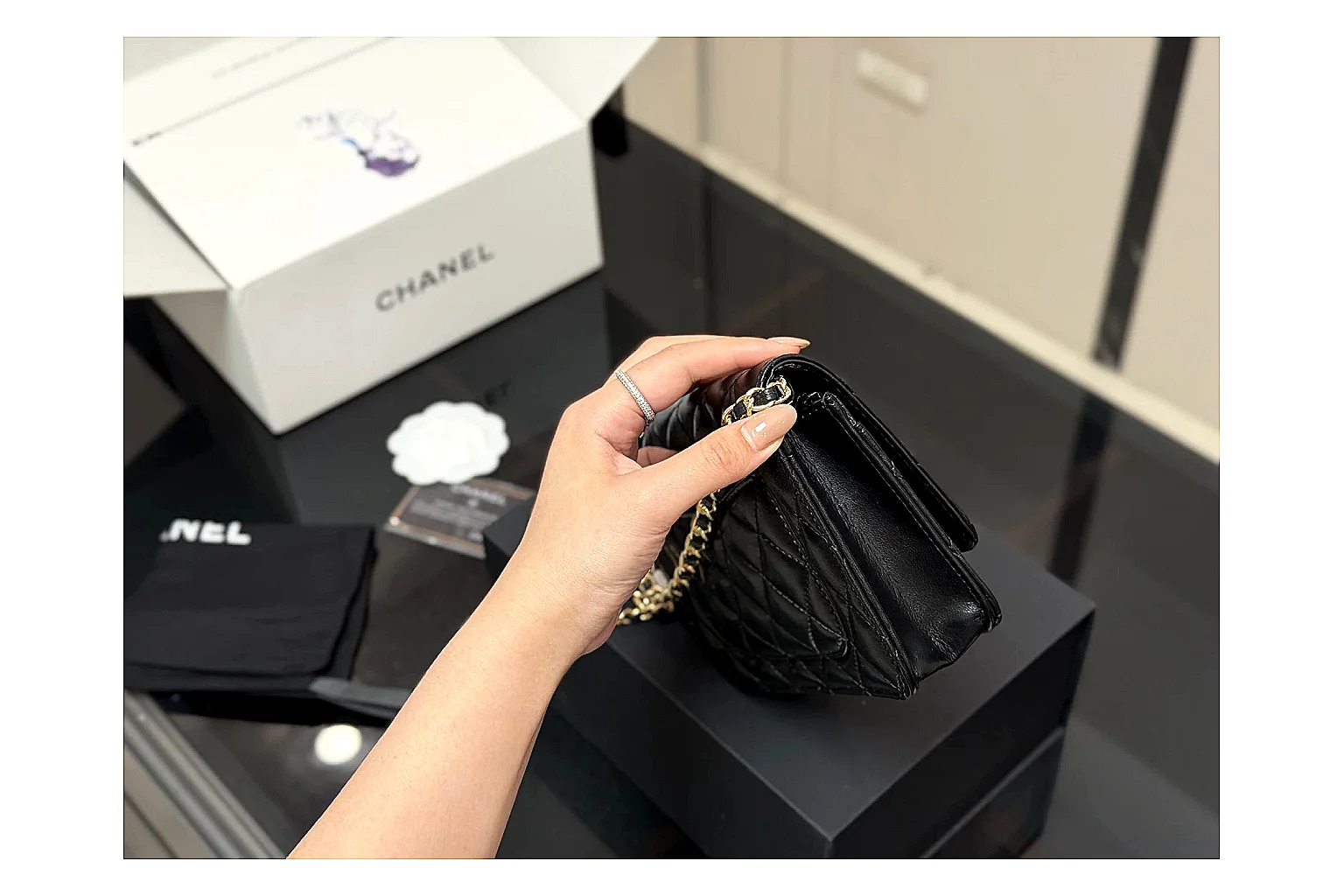 Chanel Quilted Wallet Bag Black Floral OOPBuy route photo showing black quilted wallet-bag body, floral detail, compact flap shape, and polished chain hardware thumbnail 4