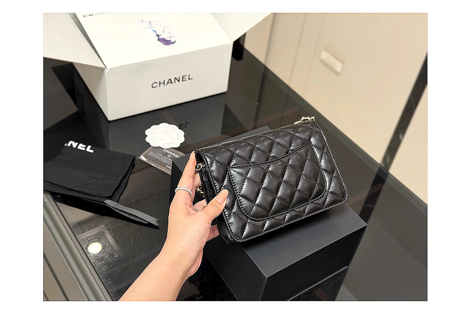 Chanel Quilted Wallet Bag Black Floral OOPBuy route photo showing black quilted wallet-bag body, floral detail, compact flap shape, and polished chain hardware thumbnail 6