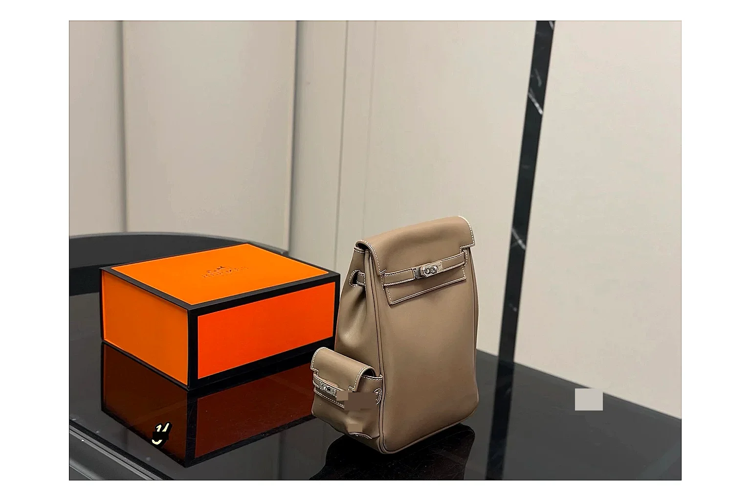 Hermes Kelly Backpack Beige OOPBuy route photo showing beige leather backpack body, Kelly-style flap, top handle, shoulder straps, and polished hardware