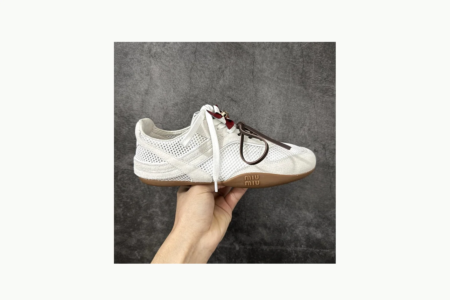 White Miu Miu low-top sneaker with bow detail, toe, heel, and sole thumbnail 2