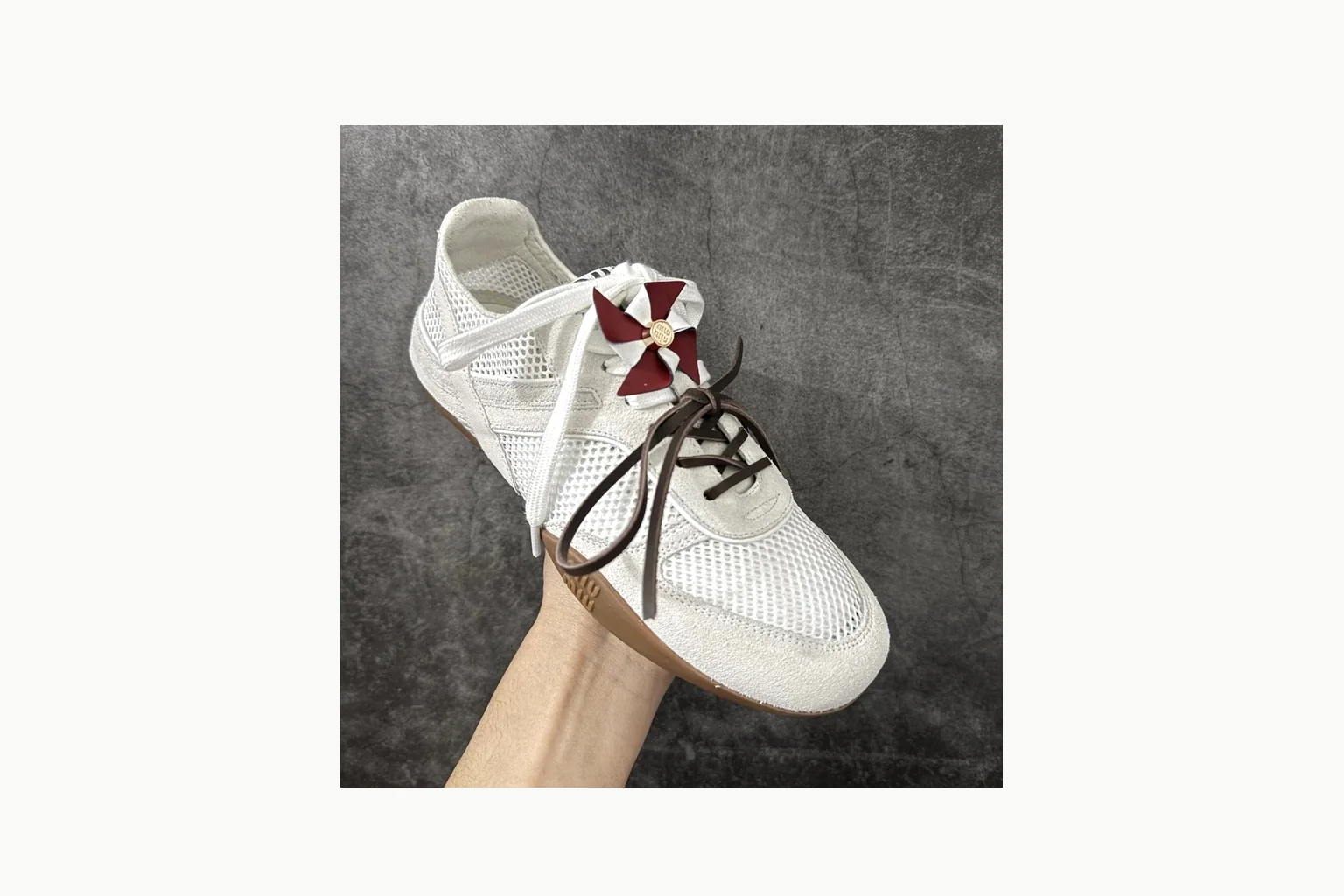 White Miu Miu low-top sneaker with bow detail, toe, heel, and sole thumbnail 3