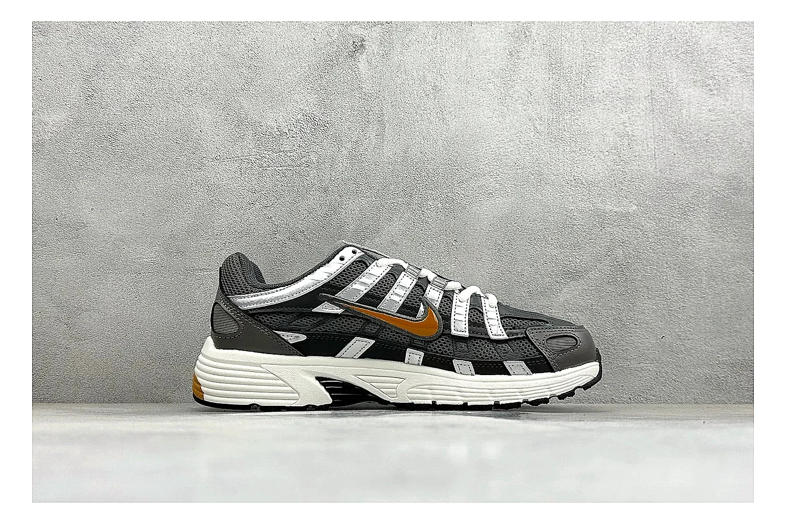 Nike P-6000 Black Orange OOPBuy route photo showing black layered runner upper, orange accent hits, retro P-6000 paneling, and cushioned casual sole thumbnail 2