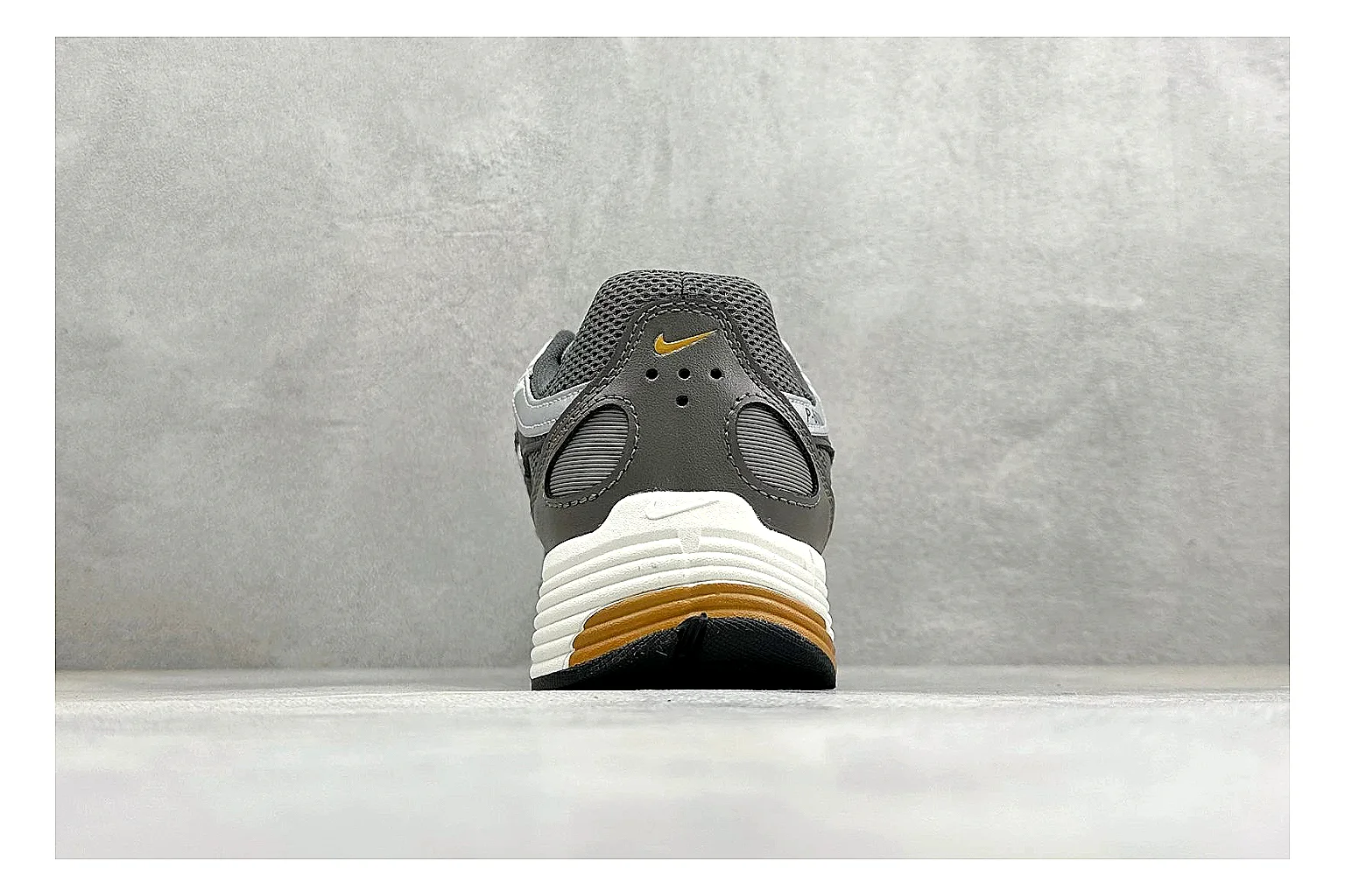 Nike P-6000 Black Orange OOPBuy route photo showing black layered runner upper, orange accent hits, retro P-6000 paneling, and cushioned casual sole thumbnail 4