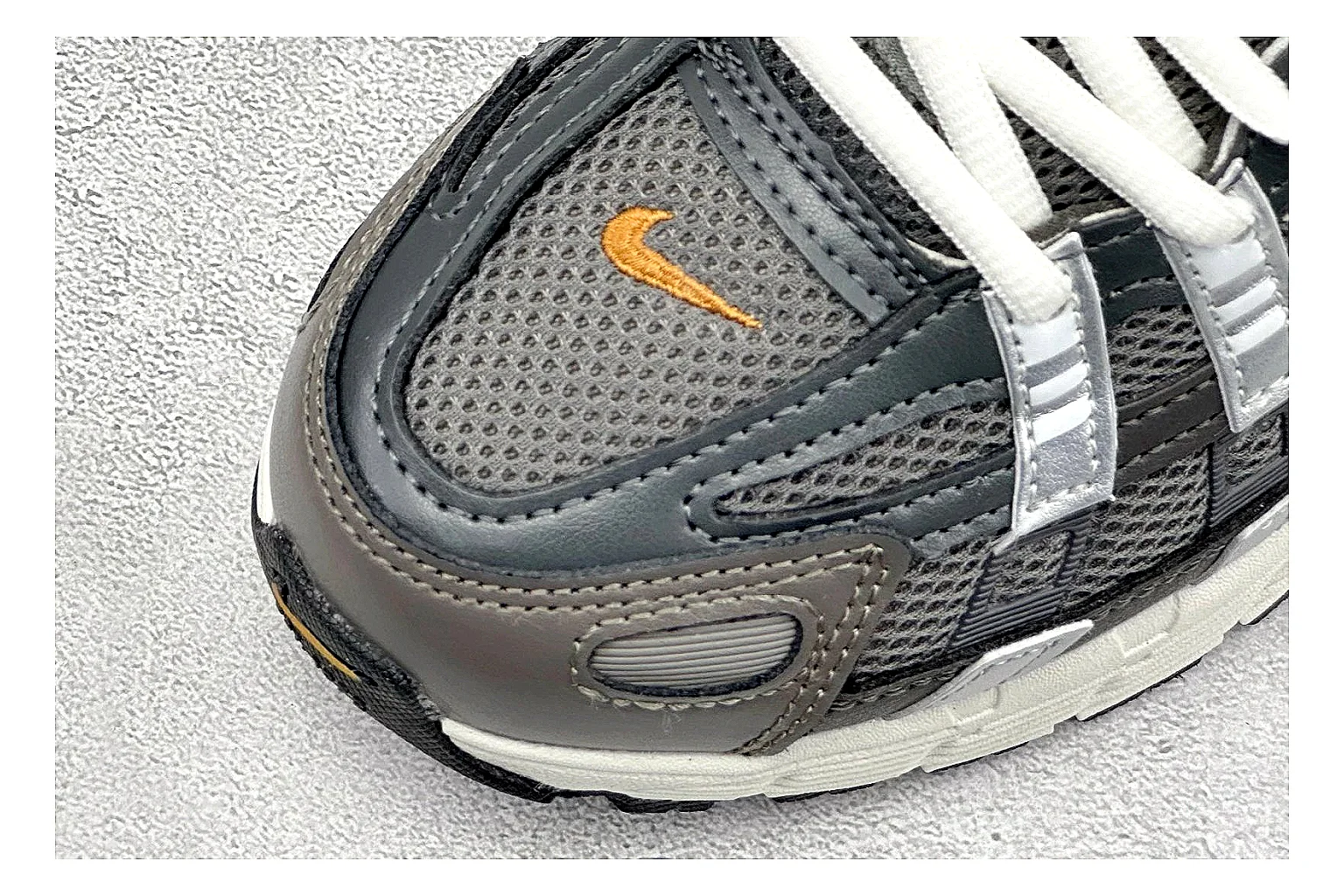 Nike P-6000 Black Orange OOPBuy route photo showing black layered runner upper, orange accent hits, retro P-6000 paneling, and cushioned casual sole thumbnail 6